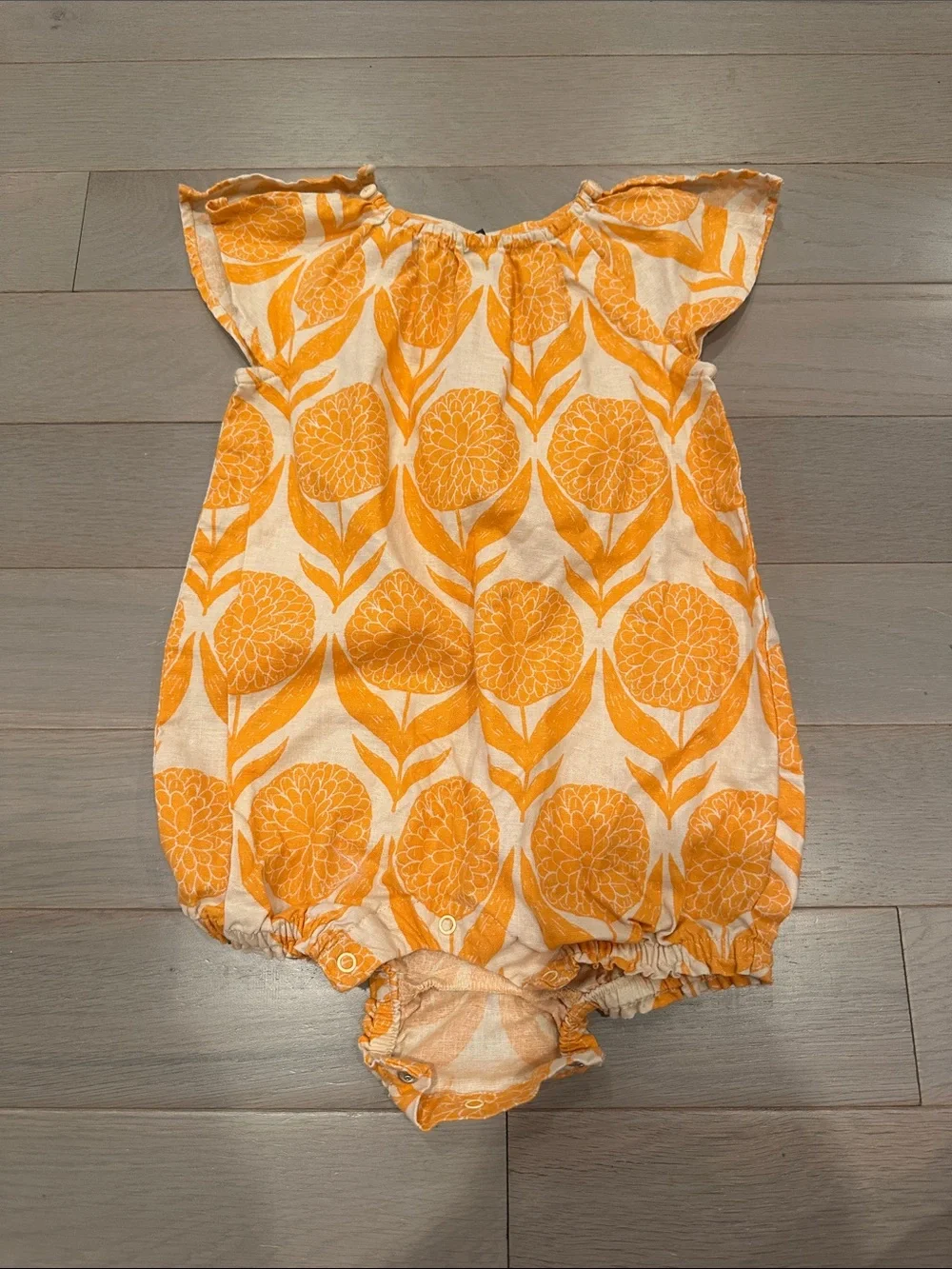 Tea Collection Orange and White Floral Baby Romper